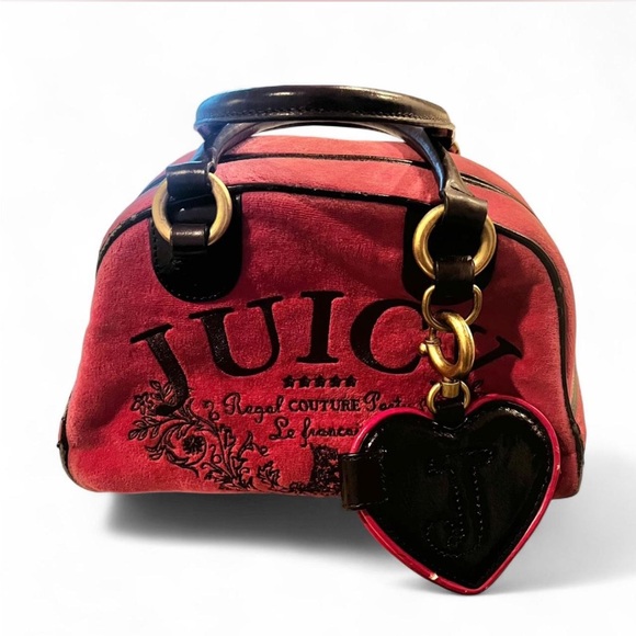 Juicy Couture Handbags - Vintage Juicy Couture pink Bag with Heart Charm